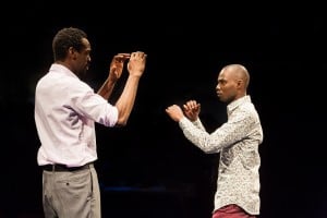 (l-r) Sule Rimi as Joe and Fiston Barek as Dembe in THE ROLLING STONE by Chris Urch (Royal Exchange Theatre until 1 May). Photo - Jonathan Keenan