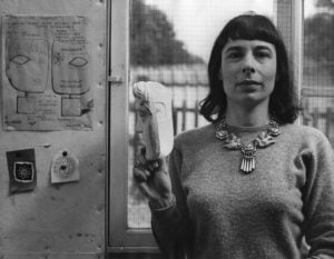 Mitzi Cunliffe with designs and a version of the BAFTA mask (credit: Estate of the artist).