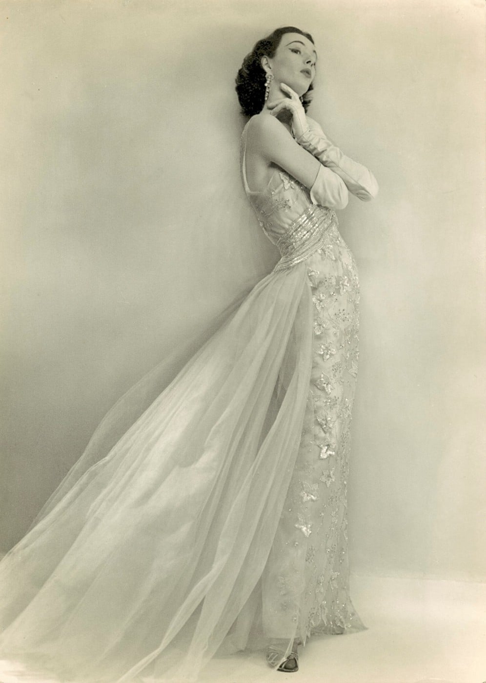 June modelling a pale pink beaded silk evening dress by Worth about 1952 -55 photograph by Michael Dunne Gloucester Cromwell Roads London