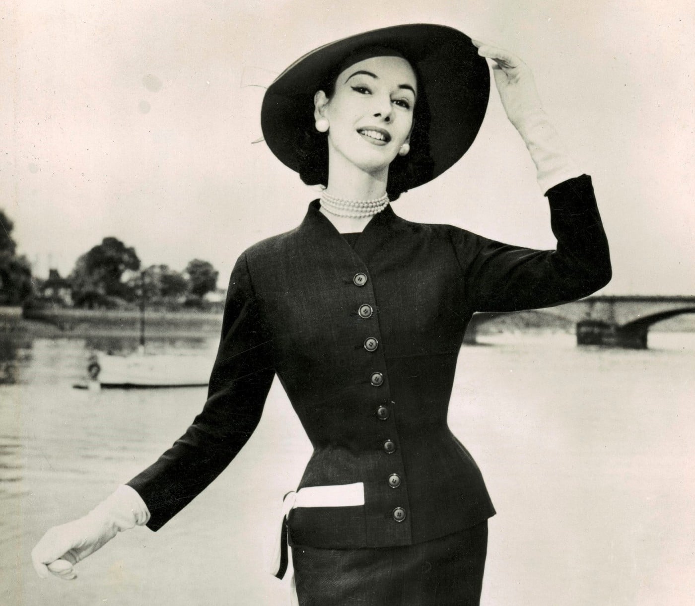June modelling a tailored wool suit holding the brim of her picture hat about 1951-52 location and photographer unknown (2)