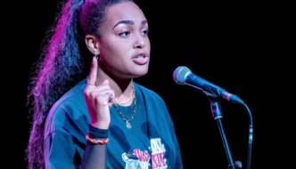 Woman in font of microphone