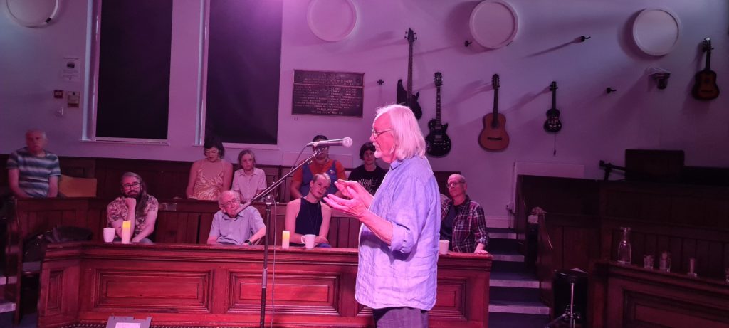 Image of James Fernie performing in front of a crowd.