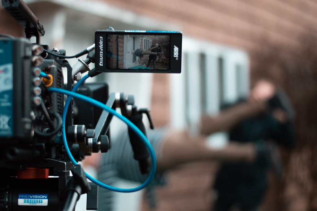 Close-up image of a camera filming on the set of 'Hanging On.'