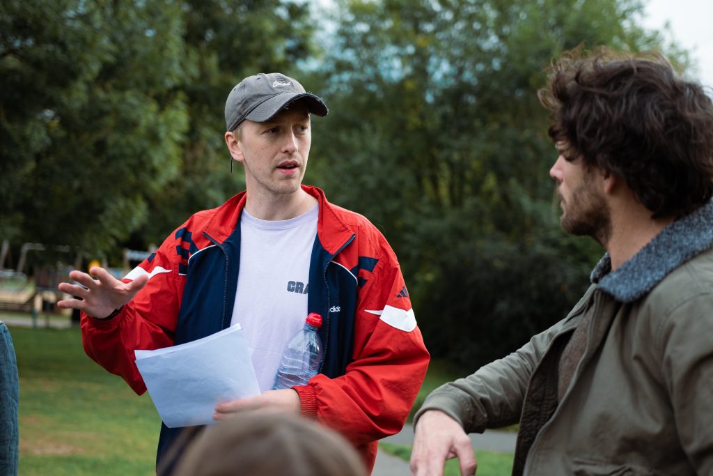 Image of Alfie giving directions.