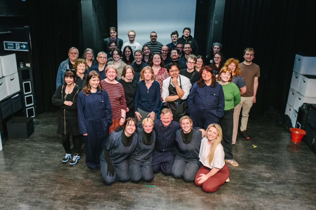 Leeds Arts Centre’s 1984 cast and crew pictured on stage at the Carriageworks Theatre. 
