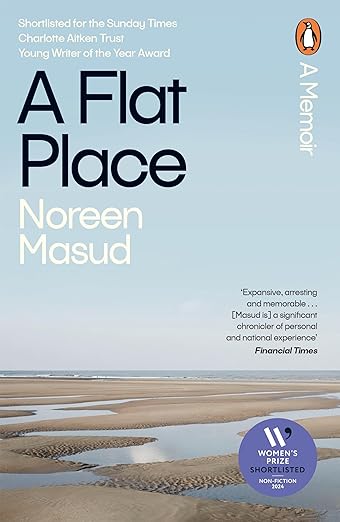 Book cover for A Flat Place by Norren Masud, featuring a full cover image of a flat beach leading to the ocean with the title in bold black typography to the top left of the cover and the authors name below in white. 